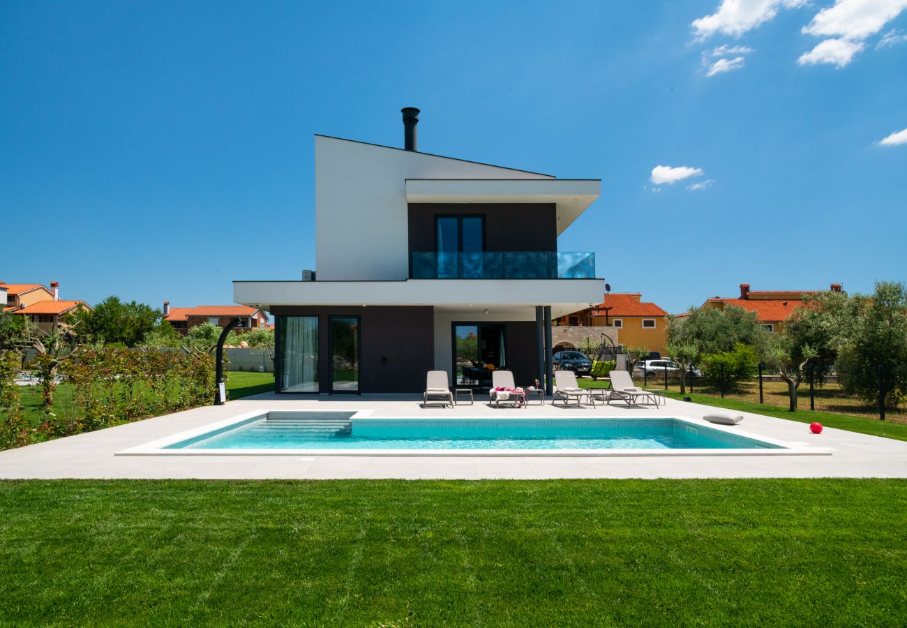 Villa a Vodnjan - Villa Arestea in Vodnjan with sea view, wellness & playground