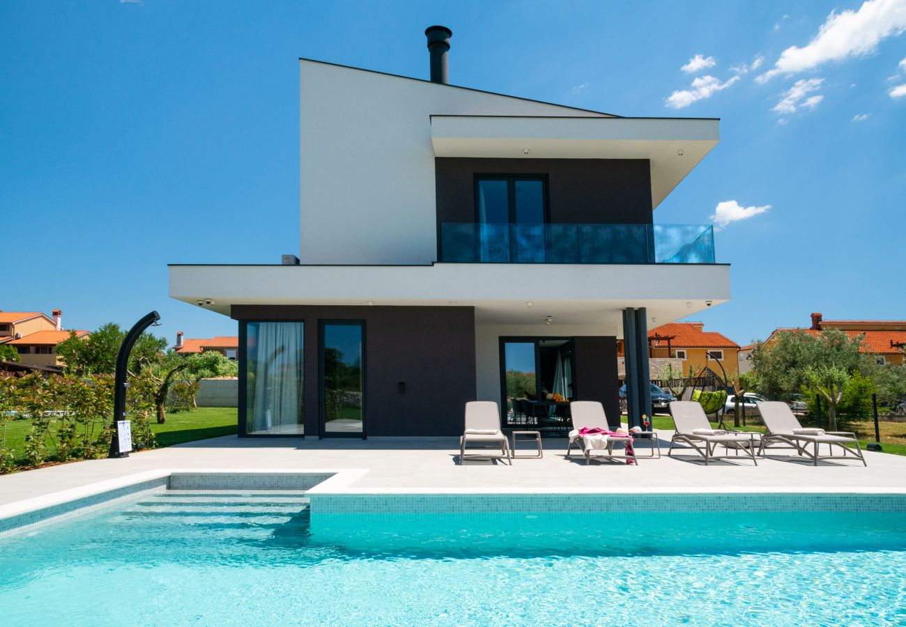 Villa a Vodnjan - Villa Arestea in Vodnjan with sea view, wellness & playground