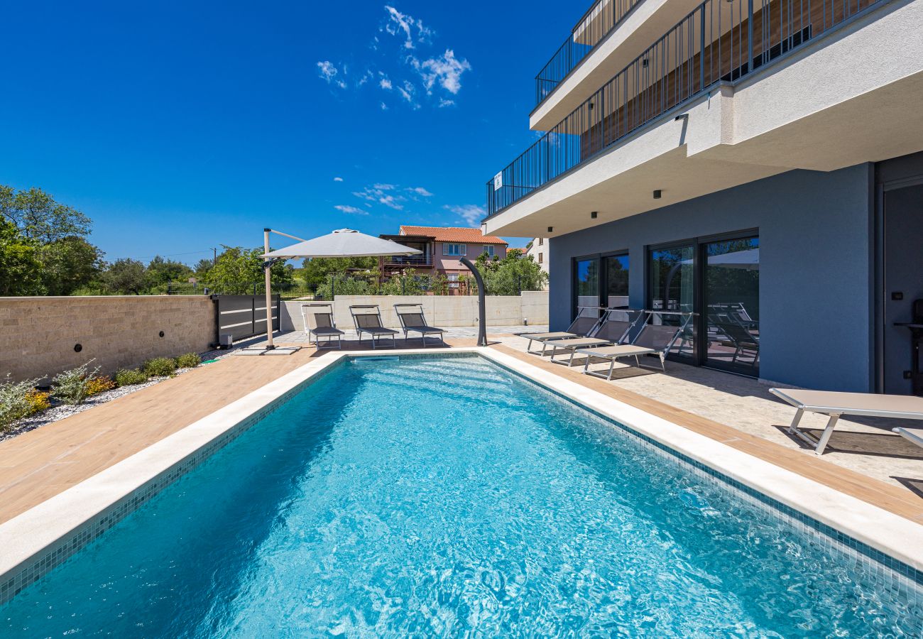 Villa a Medulin - Villa Bay II near Medulin for 9 people with heated pool - playground & whirpool only 100 meters from the beach