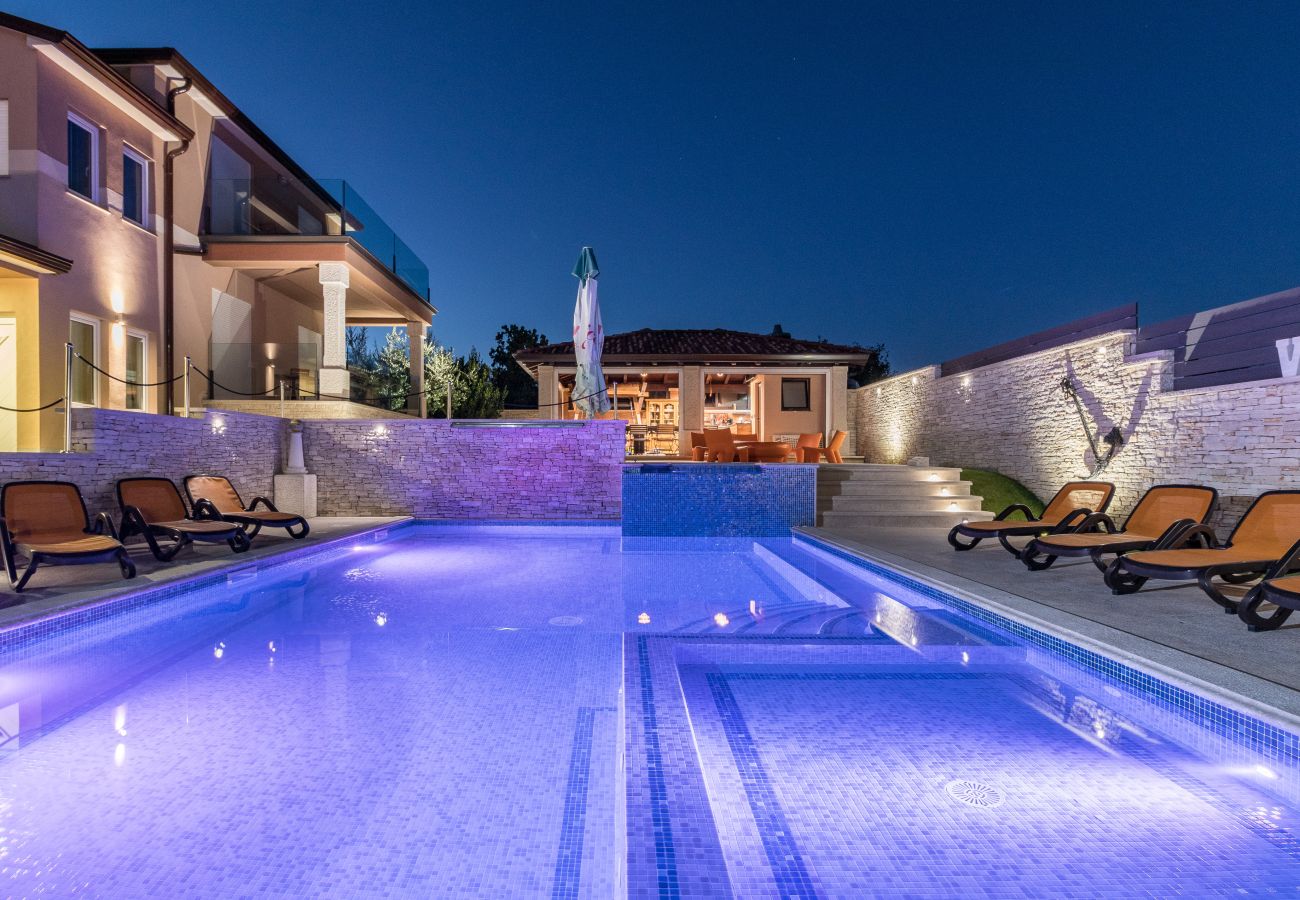 Villa a Ližnjan - Villa Istra Kamen for kids & families near Pula for 18 people with sport activities, wellness & 67 m2 heated private pool